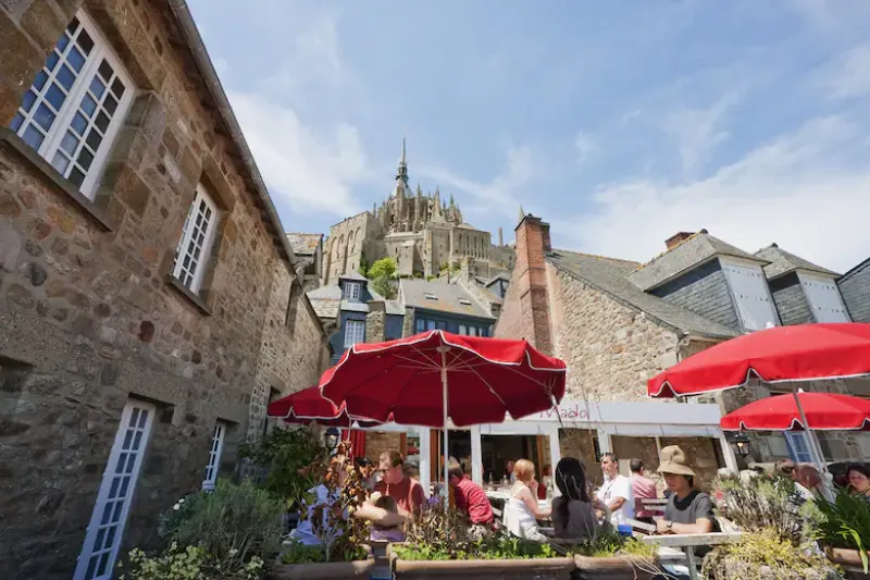 Restaurant In The Fortified Village And Abbey Of Mont-Saint-Michel, France (Photo by: Insights/Universal Images Group via Getty Images)Insights - Universal Images Group Editorial